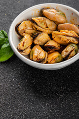 Mussels canned seafood appetizer dish organic product fresh tasty gourmet food background on the table rustic food top view copy space keto paleo pescetarian diet vegetarian food