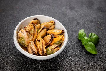 Mussels canned seafood appetizer dish organic product fresh tasty gourmet food background on the table rustic food top view copy space keto paleo pescetarian diet vegetarian food