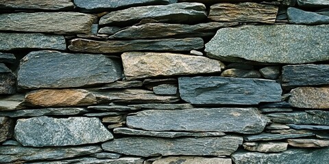 Fototapeta premium natural slate stone wall texture for outdoor and interior design inspiration