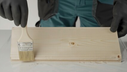 A craftsperson transforms wood with a beautiful stain, showcasing techniques. Creative