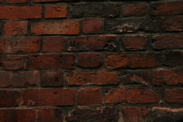 Grunge dark red brick wall texture with worn and aged surface — realistic old masonry background for architectural design, 3D rendering, or vintage style compositions