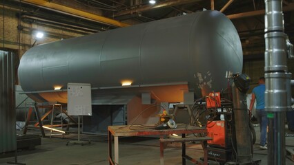 The Industrial Vessel is present within the Workshop where the Manufacturing Process takes place. Media