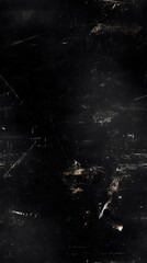 Dark surface texture with numerous scratches and marks.