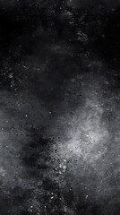 Dark, textured surface with mottled gray tones.