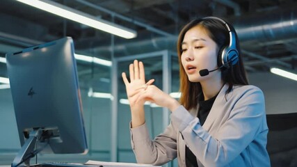 Professional communication in technology: An attentive professional uses communication technology, showcasing focused engagement and the dynamics of modern virtual interaction.