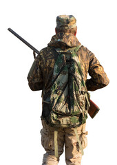 Hunting period, autumn season open. A hunter with a gun in his hands in hunting clothes in the...