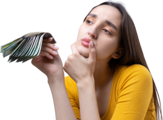 Photo of a wealthy woman in simple clothes holding a fan of dollar money isolated against a concrete wall background