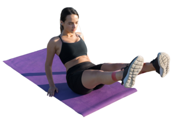 A young slim athletic girl in sportswear with snakeskin prints performs a set of exercises. Fitness and healthy lifestyle.