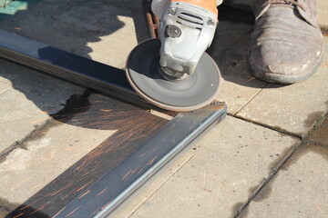 metal repair work with a grinder with beautiful sparks	
