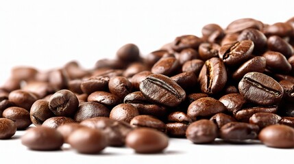 Naklejka premium Pile of Roasted Coffee Beans Scattered on White Background