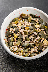Seed mix pumpkin seeds, sunflower seeds superfood natural food organic fresh tasty gourmet food background on the table rustic food top view copy space