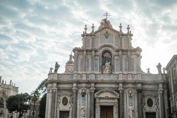 Obraz premium Facade of the Baroque Cathedral Basilica of Saint Agatha in Catania, Sicily, Italy, in soft morning light