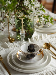 Beautiful aesthetic laid table. Decor. Dishes on the table. Spring bouquet