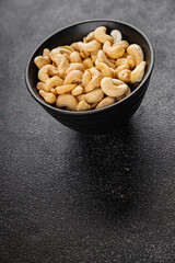 Cashew nuts natural superfood dish organic product fresh tasty gourmet food background on the table rustic food top view copy space