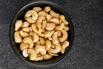 Cashew nuts natural superfood dish organic product fresh tasty gourmet food background on the table rustic food top view copy space