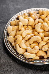 Cashew nuts natural superfood dish organic product fresh tasty gourmet food background on the table rustic food top view copy space