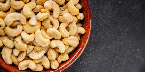 Cashew nuts natural superfood dish organic product fresh tasty gourmet food background on the table rustic food top view copy space