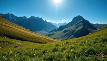 Obraz premium Majestic Alpine Valley Landscape Bathed in Sunlight with Rolling Hills and Distant Mountain Peaks, a serene and breathtaking vista