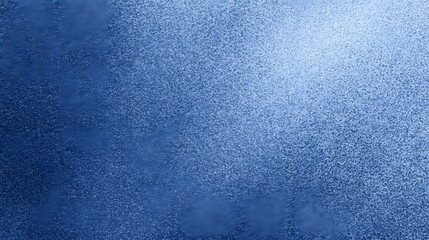 Deep blue textured surface with subtle light reflection.
