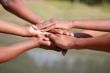 Many hands joined together for a partnership