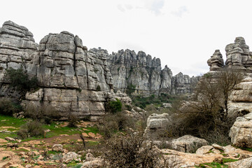 Spectacular Limestone Formations. Dramatic natural limestone shapes in El Torcal de Antequera, Spain, highlighting the rugged beauty of the Mediterranean landscape.