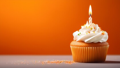 an orange first birthday cupcake with white icing one candle clean orange gradient background suitable for a header with room for text copy space