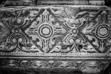 detail of a carved stone wall