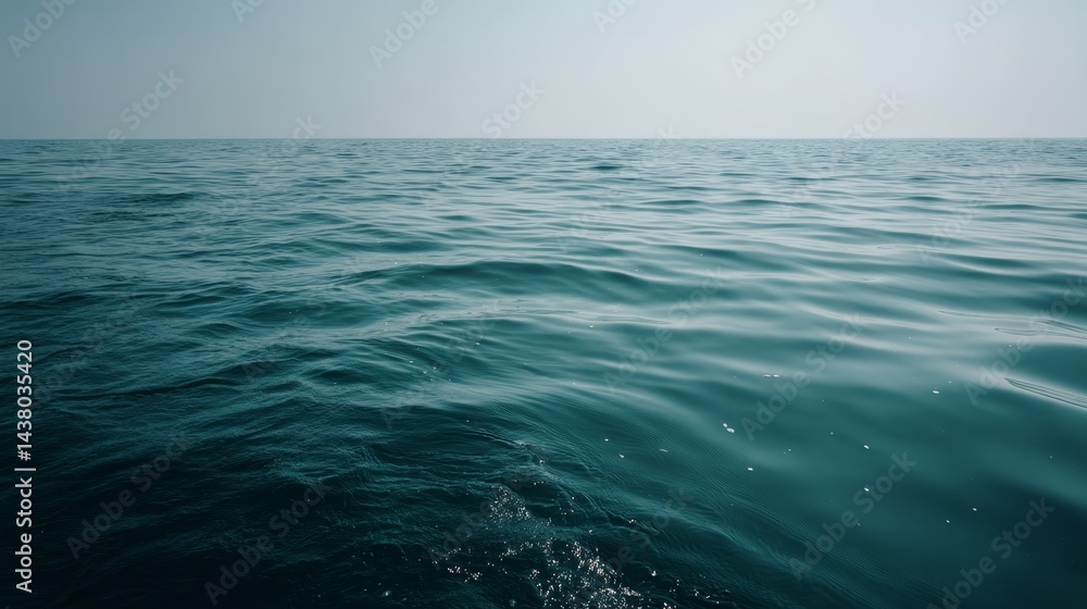 Poster this serene seascape features a deep turquoise ocean with gentle ripples under soft sunlight, creati