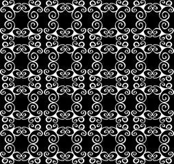 Beautiful seamless lace pattern in white on a black background