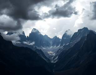 Obraz premium Dramatic Mountain Range Under Stormy Clouds