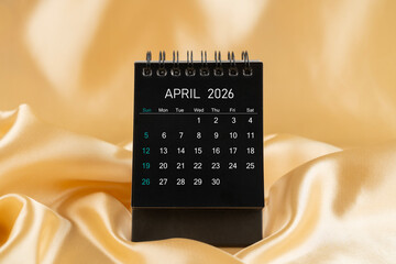 April Desk mini desk calendar black color for 2026 year on gold color silk.