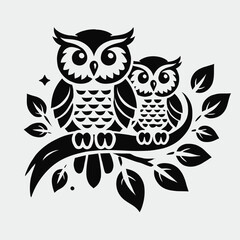 Fototapeta premium Owl and Owlet Perched Together on a Branch