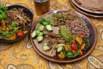 Buckwheat, seitan roast, pesto and veggie platter, an Eastern European dish