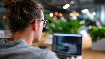 Office worker viewed from behind