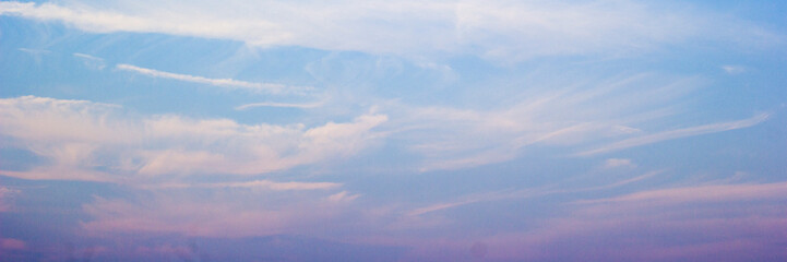  light soft panorama sunset sky background with purple clouds