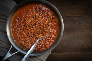 Vegan chili beans in stainless steel pan