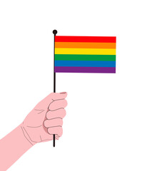 Hand holding LGBT rainbow flag - design element for pride month