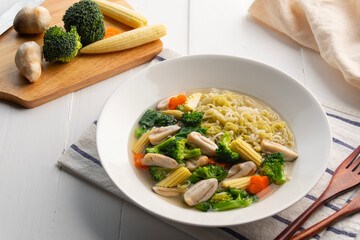 rad na,instant Japanese vegetable noodles in Gravy Sauce with broccoli straw mushroom carrot and baby corn.Thai healthy menu low calorie food diet.vegetarian food.