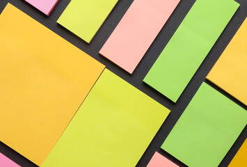 Various blank paper multicolored stickers. Sticky note collection on yellow background