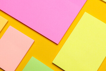 Various blank paper multicolored stickers. Sticky note collection on yellow background