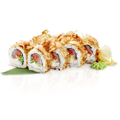 Delicious sushi rolls with tuna and katsuobushi flakes resting on bamboo leaf