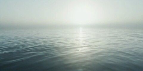 Obraz premium Scenic view of a tranquil lake under the setting sun, with calm waters reflecting the warm hues.