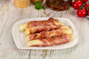 Hot mozzarella sticks with bacon