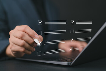 Businesswoman evaluating with checkboxes on online laptop computer. assessment survey online,...
