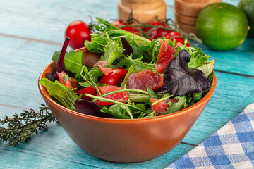 Salad with salmon and arugula