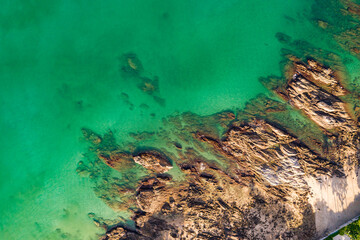 Top view seashore waves nature background,Amazing waves crashing on rocks seascape view