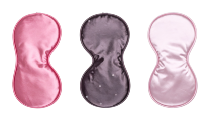 Pink and purple sleeping masks isolated on transparent background, promoting relaxation and better sleep