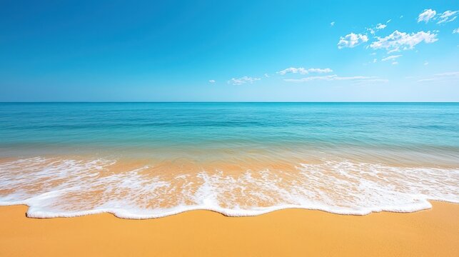Serene tropical beach scene with crystal clear turquoise water gently lapping golden sand under a vibrant blue sky with