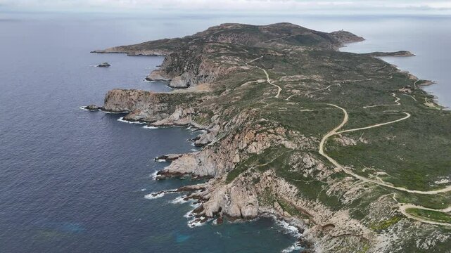 Scenic aerial view of Calvi area in Corsica France featuring a blue sea rugged coastline and rocky landscape surrounded by nature