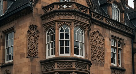 Obraz premium Ornate Stone Building With Bay Window